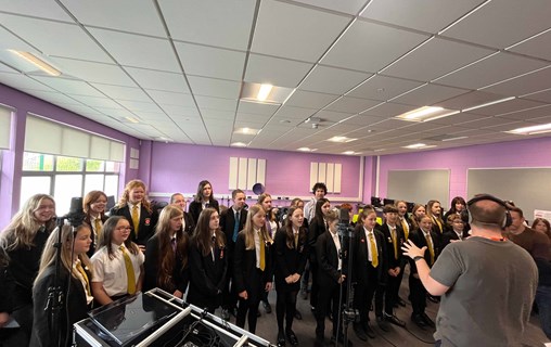 Pupils from Ysgol Harri Tudur performed the song they wrote with guidance from Craig Yates from the Aloud Charity